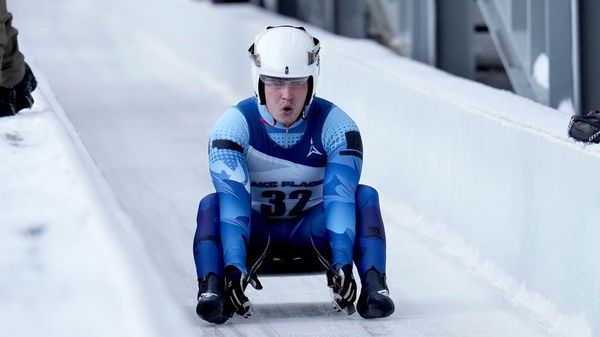 Matvei Perestoronin, a Russian luge athlete, finishes a qualifying race to compete in a Luge World Cup event in Lake Placid, New York, on December 18, 2025. - Sputnik Africa