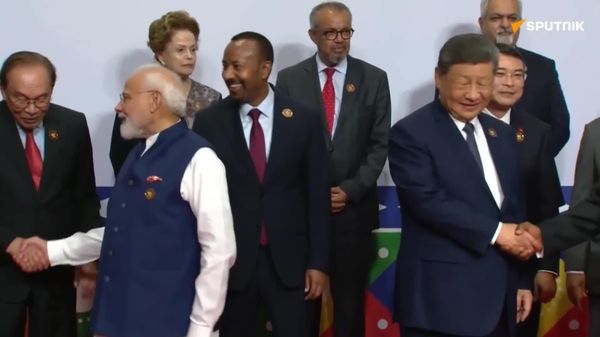 World Leaders Gather for BRICS+ 2026 'Family Photo' in New Delhi - Sputnik Africa
