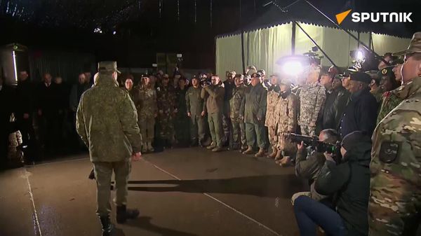 Putin meets foreign military attachés at Center-2026 - Sputnik Africa