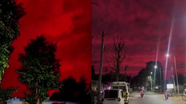 Monde à l'envers: le ciel au-dessus d'une ville indienne se pare d'un rouge sang - Sputnik Afrique