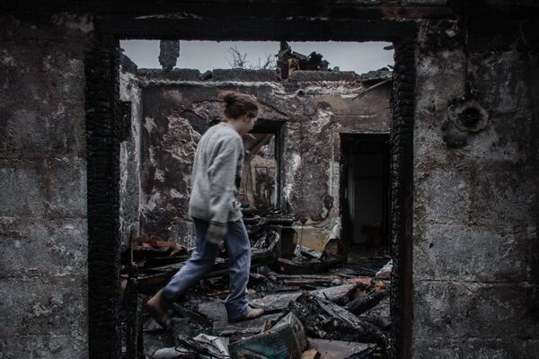 Debaltsevo: des civils évacués de la ville bombardée - Sputnik Afrique