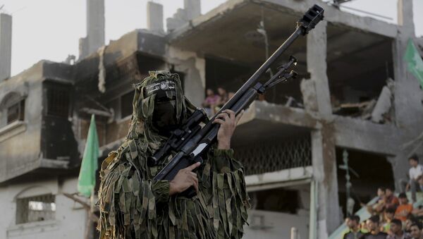 A Palestinian militant of Izzedine al-Qassam Brigades, military wing of Hamas - Sputnik Afrique