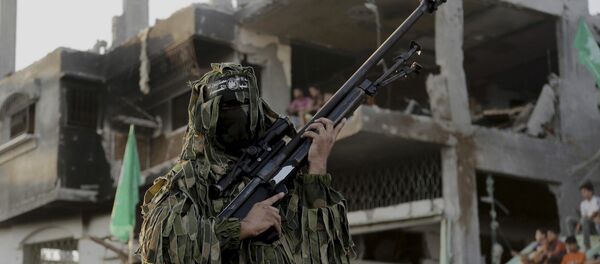 A Palestinian militant of Izzedine al-Qassam Brigades, military wing of Hamas - Sputnik Afrique