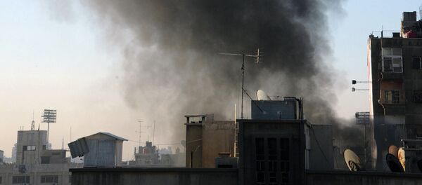 Smoke rises after rebels fired rockets and mortar shells that struck several parts in Damascus - Sputnik Afrique
