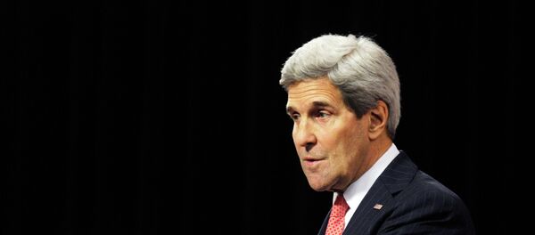 U.S. Secretary of State John Kerry leaves the NATO pressroom after giving a statement following a round table meeting of the global coalition to counter the Islamic State militant group at NATO headquarters in Brussels December 3, 2014. - Sputnik Afrique