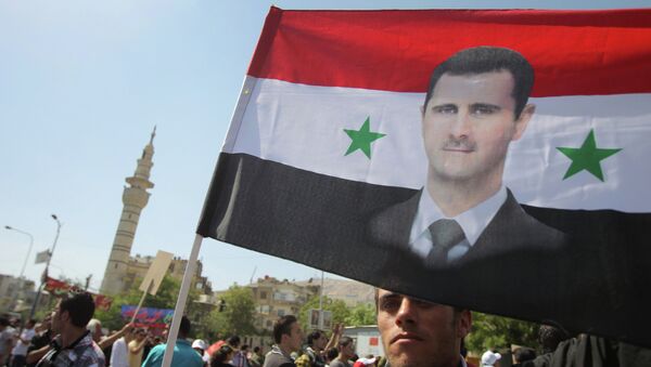 Митинг в поддержку Башара Асада в Дамаске - Sputnik Afrique