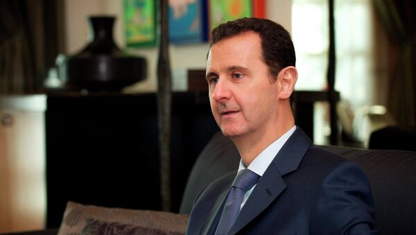 Syria's President Bashar al-Assad is seen during an interview with the American magazine Foreign Affairs published in Damascus January 26, 2015. - Sputnik Afrique
