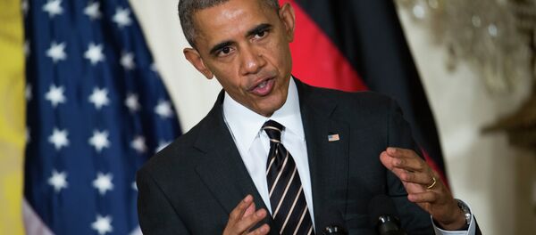 President Barack Obama gestures during a joint news conference with German Chancellor Angela Merkel in the East Room of the White House in Washington, Monday, Feb. 9, 2015 - Sputnik Afrique