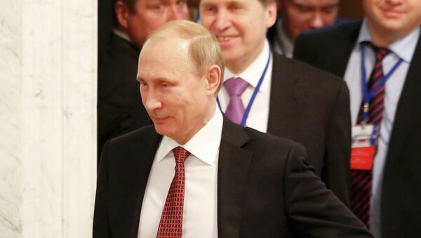 Russia's President Vladimir Putin (front) walks as he attends a peace summit to resolve the Ukrainian crisis in Minsk, February 12, 2015 - Sputnik Afrique