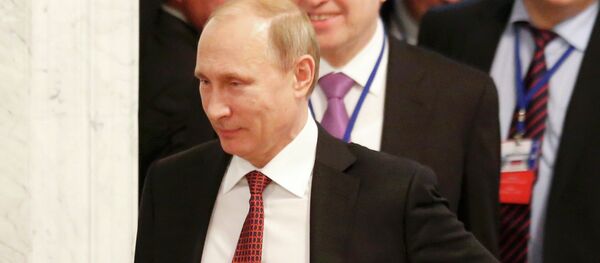 Russia's President Vladimir Putin (front) walks as he attends a peace summit to resolve the Ukrainian crisis in Minsk, February 12, 2015 - Sputnik Afrique