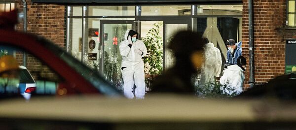 Forensic investigators are seen at the site of a shooting in Copenhagen February 14, 2015 Forensic investigators are seen at the site of a shooting in Copenhagen February 14, 2015 - Sputnik Afrique