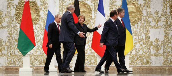 Peace talks in Minsk: Russian President Vladimir Putin, Belarusian President Alexander Lukashenko, German Chancellor Angela Merkel, French President Francois Hollande and Ukrainian President Petro Poroshenko - Sputnik Afrique