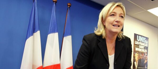 France's National Front political party head Marine Le Pen arrives to attend a news conference at the party headquarters in Nanterre near Paris February 6, 2015 - Sputnik Afrique