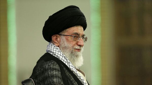 Supreme Leader Ayatollah Ali Khamenei, attends a meeting in Tehran, Iran, Sunday, Sept. 7, 2014 - Sputnik Afrique