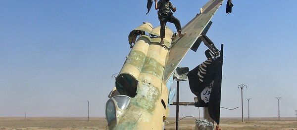 This undated image posted on Aug. 27, 2014 by the Raqqa Media Center of the Islamic State group, a Syrian opposition group - Sputnik Afrique