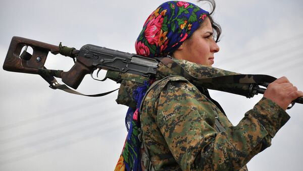 Une combattante kurde - Sputnik Afrique