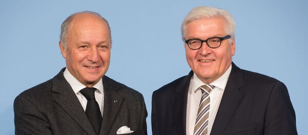 German Foreign Minister Frank-Walter Steinmeier, right, and his French counterpart Laurent Fabius German Foreign Minister Frank-Walter Steinmeier, right, and his French counterpart Laurent Fabius - Sputnik Afrique