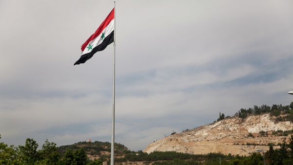 Syrian flag over the capital, Damascus, Syria - Sputnik Afrique