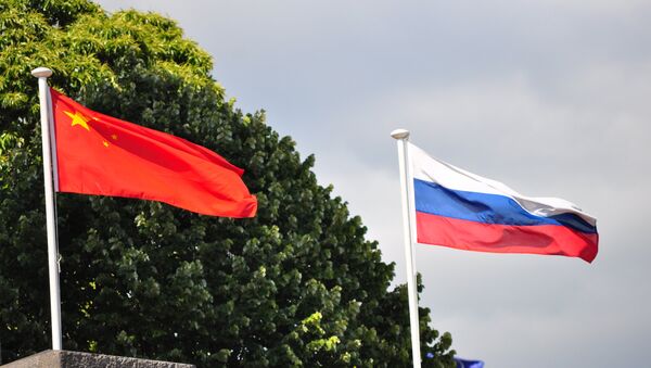 Drapeaux russe et chinois - Sputnik Afrique