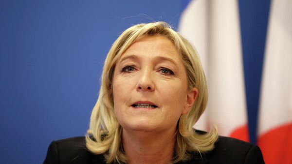 France's National Front political party head Marine Le Pen speaks during a news conference at the party headquarters in Nanterre near Paris February 6, 2015. - Sputnik Afrique