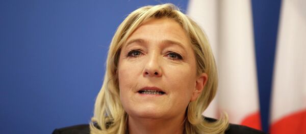 France's National Front political party head Marine Le Pen speaks during a news conference at the party headquarters in Nanterre near Paris February 6, 2015. REUTERS/Charles Platiau - Sputnik Afrique