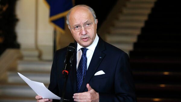 French Foreign Affairs Minister Laurent Fabius speaks after a meeting with Foreign affairs ministers of Ukraine, Russia and Germany, February 24, 2015 - Sputnik Afrique