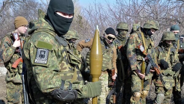 Fighters of Ukrainian volonteer Azov battalion take part in military exercises not far southeastern Ukrainian city of Mariupol, on February 27, 2015 - Sputnik Afrique