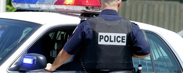 Policier américain - Sputnik Afrique