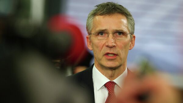 NATO Secretary General Jens Stoltenberg speaks with journalists prior to an Informal Meeting of EU Defence Ministers in Riga, Latvia on January 18, 2015 - Sputnik Afrique