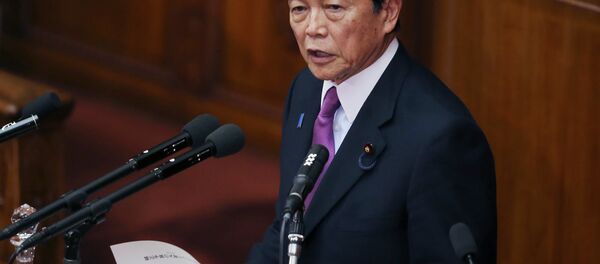 Japan's Finance Minister Taro Aso speaks during a opening session at the lower house of Parliament in Tokyo, Monday, Jan. 26, 2015 - Sputnik Afrique
