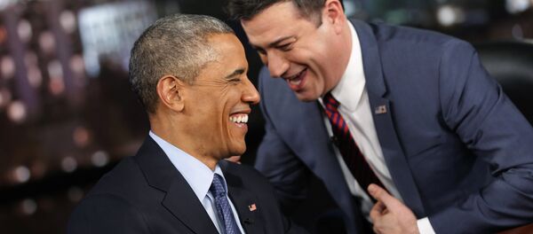 U.S. President Barack Obama laughs with show host Jimmy Kimmel during a commercial break in a taping of Jimmy Kimmel Live in Los Angeles March 12, 2015 - Sputnik Afrique
