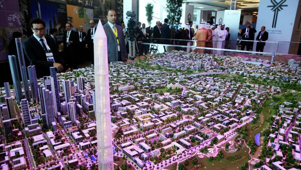 A model of a planned new capital for Egypt is displayed for investors at the opening of the Egypt Economic Development Conference (EEDC) in Sharm el-Sheikh, in the South Sinai governorate, about 550 km (342 miles) south of Cairo, March 13, 2015 - Sputnik Afrique