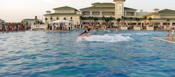 A picture taken on July 4, 2014, shows a man riding a jet-ski at the Turkmenistan's new Caspian Sea resort of Avaza. - Sputnik Afrique