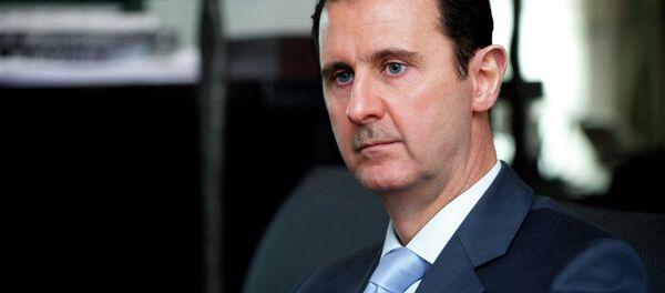 Syrian President Bashar al-Assad giving an interview. File photo - Sputnik Afrique