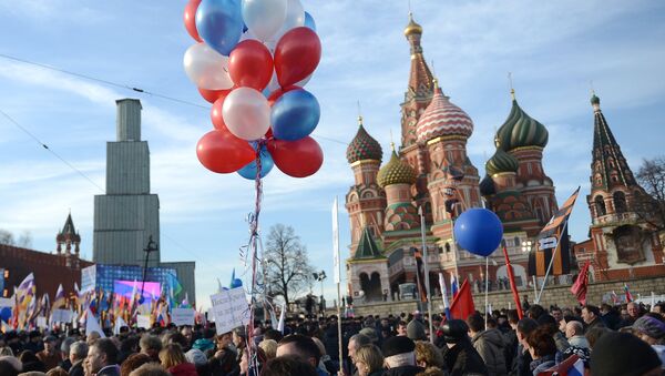 Rally and concert on Vasilyevsky Slope to mark anniversary of Crimea's reunification with Russia - Sputnik Afrique