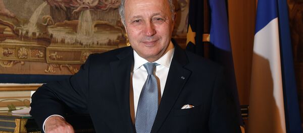 French Foreign Minister Laurent Fabius poses after an interview in Paris on January 6, 2015 in Paris. - Sputnik Afrique