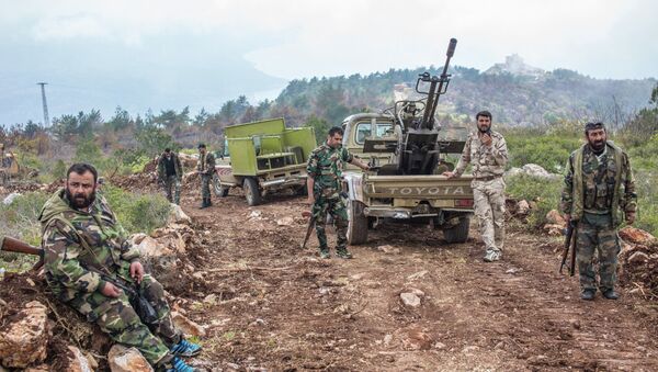 Syrian soldiers on a mountain not far from the militants' positions near Kessab - Sputnik Afrique