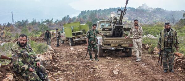 Syrian soldiers on a mountain not far from the militants' positions near Kessab - Sputnik Afrique
