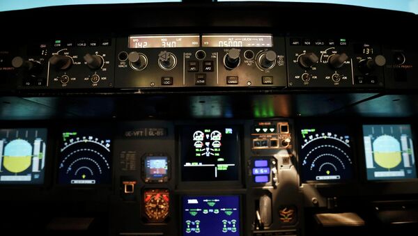 A picture inside a flight simulator shows the the cockpit of an Airbus A320 in Vienna on March 26, 2015. - Sputnik Afrique