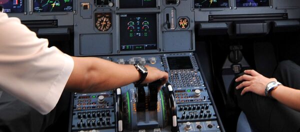 Pilots in the cockpit of an Airbus A320 at Cengkareng airport in Jakarta. File photo - Sputnik Afrique