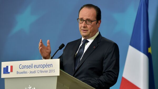 France's President Francois Hollande addresses a news conference after an European Union leaders summit in Brussels February 12, 2015. - Sputnik Afrique