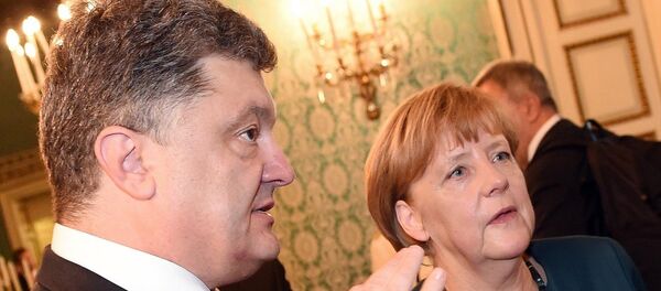 Petro Poroshenko and Angela Merkel - Sputnik Afrique
