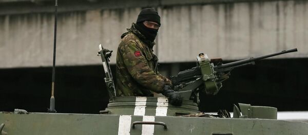 Soldiers of the Ukrainian armed forces sit in a self-propelled howitzer near Artemivsk, eastern Ukraine, March 2, 2015. - Sputnik Afrique