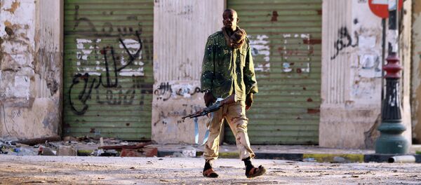 A Libyan soldier, loyal to Libya's internationally recognised government of Abdullah al-Thani and General Khalifa Haftar - Sputnik Afrique