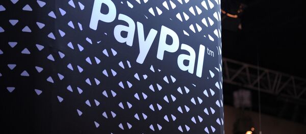 The logo of online payment company PayPal is pictured during LeWeb 2013 event in Saint-Denis near Paris on December 10, 2013 - Sputnik Afrique