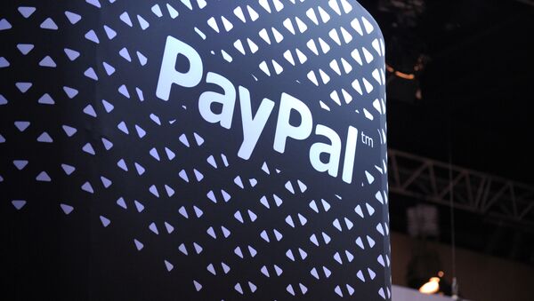 The logo of online payment company PayPal is pictured during LeWeb 2013 event in Saint-Denis near Paris on December 10, 2013 - Sputnik Afrique