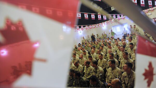 Canadian soldiers attend the handover ceremony to US forces at Kandahar airbase. File photo - Sputnik Afrique
