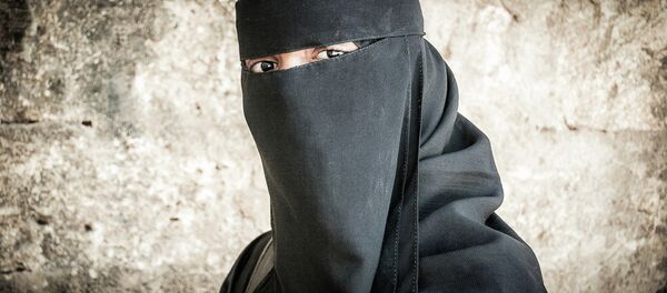Une femme portant le niqab - Sputnik Afrique