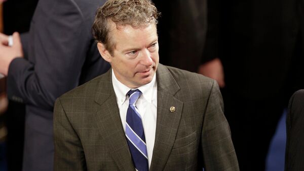 U.S. Sen. Rand Paul (R-KY) arrives in the House Chamber prior to Israeli Prime Minister Benjamin Netanyahu's address to a joint meeting of Congress in the House Chamber on Capitol Hill in Washington, March 3, 2015 - Sputnik Afrique