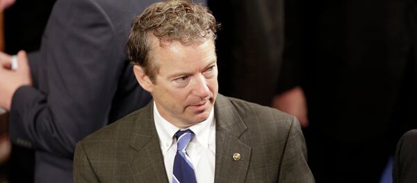 U.S. Sen. Rand Paul (R-KY) arrives in the House Chamber prior to Israeli Prime Minister Benjamin Netanyahu's address to a joint meeting of Congress in the House Chamber on Capitol Hill in Washington, March 3, 2015 - Sputnik Afrique